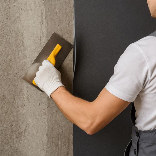 Монтаж звукоизоляционной мембраны ШУМОТЕК на стену